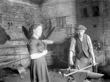 Blacksmith & Woman striker