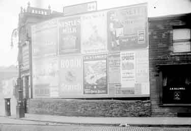 Billboards, Junction of Bradford Road and the Great Northern Railway, Dewsbury. Holidays and rail travel were becoming increasingly popular as the posters for Grimsby and Loch Lomond show.