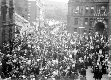 Royal Visit, King George V and Queen Mary, Market Place, Dewsbury. Crowds leaving after the Royal Visit.