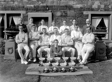 Cricket team with trophies