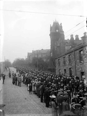 Procession of men in uniform, Staincliffe