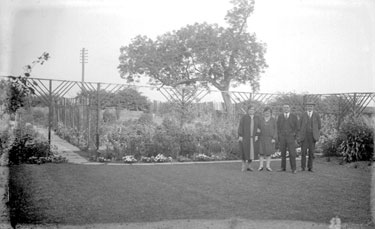 Two men and two women in garden