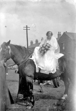 Bride sat on horse