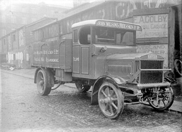 John Wilsons Hide & Skin Co Ltd 'Karrier' Lorry of Westfield Mills, Heckmondwike, parked outside Golby Garage