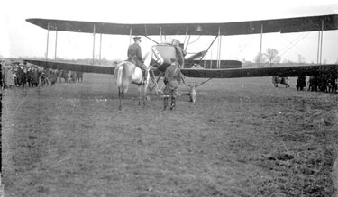 Aeroplane with man on horse