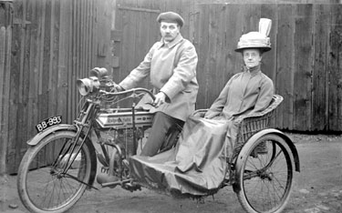 Motorbike (Rudge Multi) with Sidecar, man and woman sitting on
