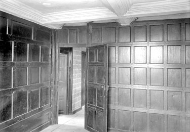 Granny Hall, Brighouse: interior showing ornate oak panelling .