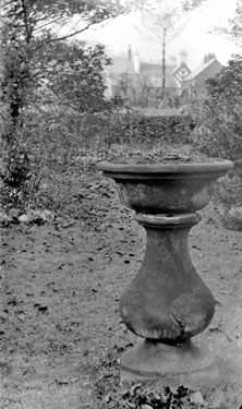 Large bell shaped vase in garden