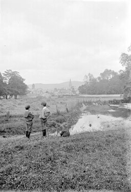 Children looking towards Ruskin Village, North Wales