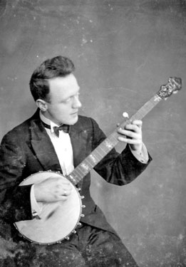 Mr J Baldwin playing banjo