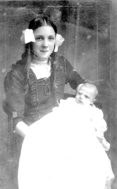 Portrait of girl and baby