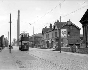 W. Naylor's shop corner of Cliffdale Road, Leeds with a tram 'No. 6 Meanwood, via Meadow Lane'