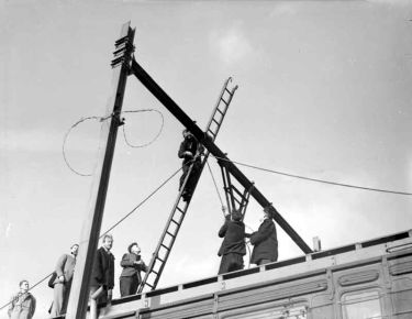 Electrification of railway by workmen, South Yorkshire