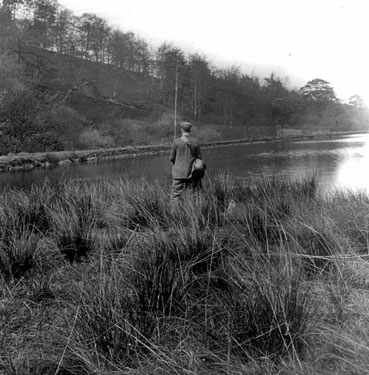 Brownhill Mill Dam, a man fishing
