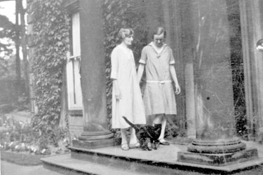 Two women and cat