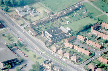 Aerial view of Littletown Infants & Junior, Bradford Road, Littletown, Liversedge, showing Eddercliff Crescent to the left and Garden Avenue to the right of the school