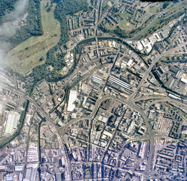 Aerial view of Huddersfield Town Centre (middle bottom), King's Mill Lane and Snow Island left top