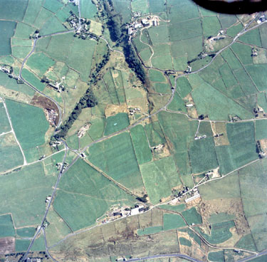 Aerial view of Slaithwaite Moor showing Heys Lane at bottom leading to Heys Laund Road from left bottom leading to Crimea Lane at top of triangle and Pole Gate top right with Causeway leading off left