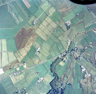 Aerial view and Blackmoorfoot showing Chain Road running from bottom right to top middle joining Slaithwaite Road; Varley Road (bottom) and Holt Head Road (bottom left)