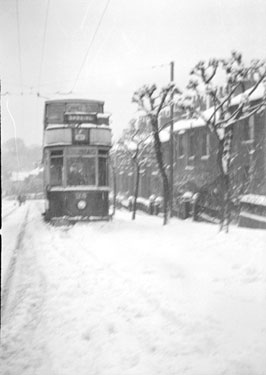 Tram in snow on Birkby Switchback