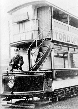 Tram - No 49, the first top covered car also featuring a canvas roll up door