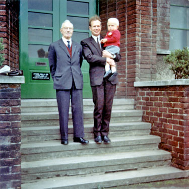 D. H. & Co. (Scotland) opened in September, making up rugs from pieces woven and sent from Huddersfield - from left: Philip Dyson, Geoffrey Dyson and child
