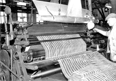 Herbert Greenfield - the cloth is a woven striped alpaca and is being cropped prior to working
