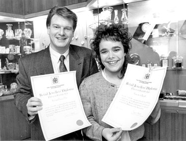 Messrs. Fillans & Sons Ltd, Jewellers, No.2 Market Walk - Retail Jewellers' Diplomas awarded to sales exec. Richard Fillan and Sales Assistant Sara Bennett, sponsored by Nat. Assoc. of Goldsmiths.