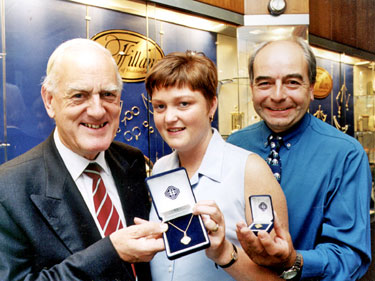 Messrs. Fillans & Sons Ltd, Jewellers, No.2 Market Walk - Fiona Burnett & Stephen Turner, winners of Hallmark 2000 Compet. run by Examiner. Fiona won a pendant and Stephen a tie tack, 9ct gold awarded