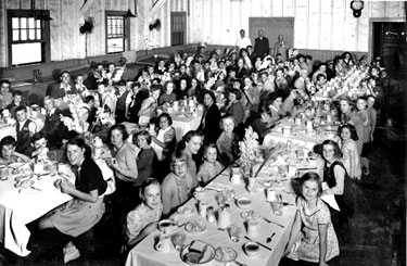 Young evacuees, children of Hoover Employees sent to USA in WWII: children in canteen at Hoover camp.