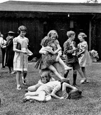 Young evacuees, children of Hoover Employees sent to USA in WWII:playing