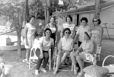 Young evacuees, children of Hoover Employees sent to USA in WWII: Reunion - back from left, Ruthie, Millie, Lais, Ilene, Sally; front, Jackie, Bash, Marilyn