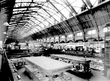 Interior of the Old Huddersfield Market Hall, King Street - stalls include: John Lewis Big Book Stall, Lodge's Grocery Stall