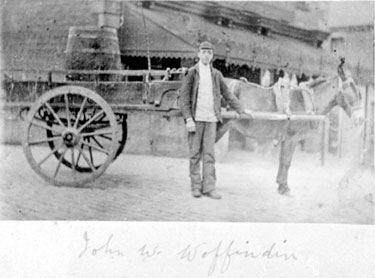 John W. Woffindin, with his donkey and cart