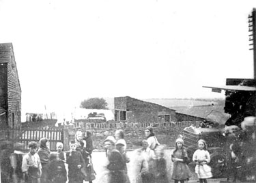 Children in Scholes, Cleckheaton (Scholes Bus on right)