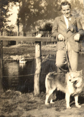 Peter and dog, from Wheelwright Grammar School Photo Album: 1920s/30s