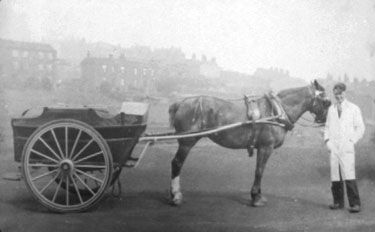 Man with horse and cart, off Halifax Road, with Northfield Street in the background