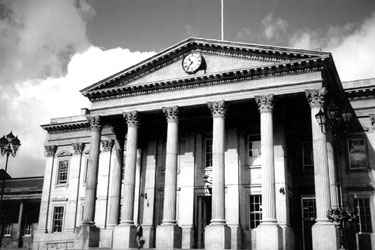 Huddersfield Railway Station - showing the impressive main entrance with its classical style fluted Corinthian columns.