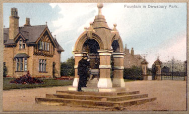 Drinking Fountain in Dewsbury Park, with park gates in background (colour photographic postcard).