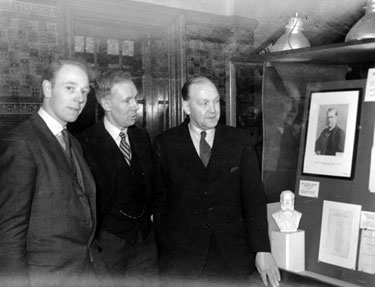 Candidates for the Parliamentary Election, inspecting an exhibition at the Central Library (left to right: James Ramsden, Granville Slade and Will T. Paling).