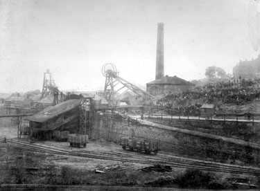 Thornhill Colliery, Dewsbury - with a gathering of people assembled on a grassy slope. Photograph taken just after the mining disaster that occurred in 1893.