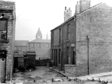 View of Nos: 83, 85 and 87 New Street, Batley.  The image also shows rag warehouses on Cobden Street (Ref. houses 48, 49, 50, 206 and 207).
