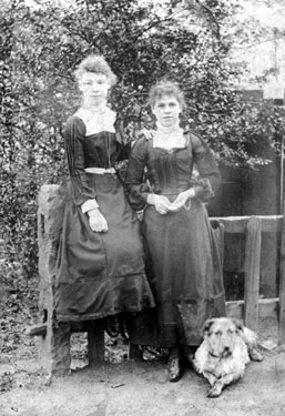 Two young women and dog