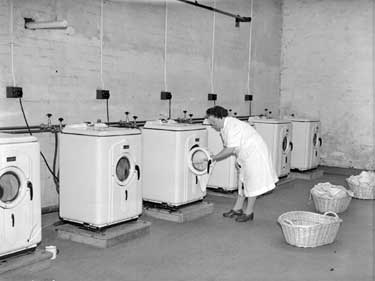 John Brooke and Sons Ltd mill laundry. During the Second World War more women had been drawn into work to support the war effort. In 1948 John Brooke and Sons Ltd installed a laundry at their mill to handle the washing needs of their staff. 	