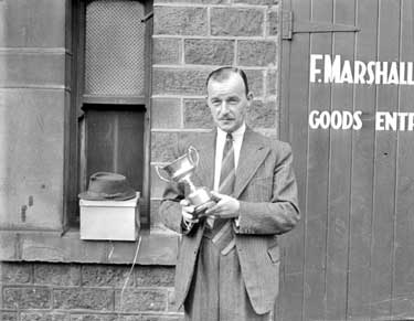 Mr R Arnott with Cup, Yorkshire Post 	