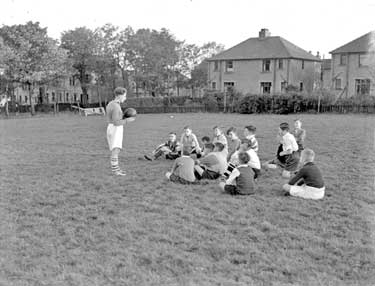 Group of Young Footballers, with Mr Metcalf 	