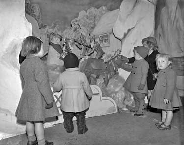 Children in Christmas Grotto 	