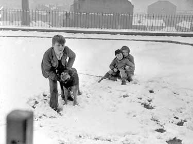 Children with dog in snow, Brighouse 	