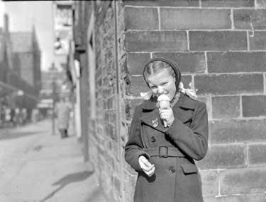 Miss P Shelton (age 11) eating ice-cream 	