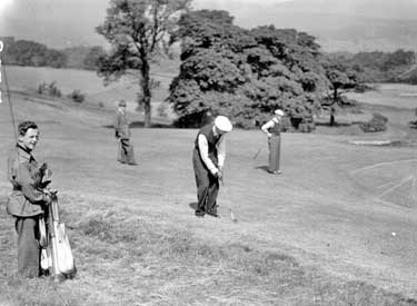 Golfers at Crosland Heath Golf Club 	